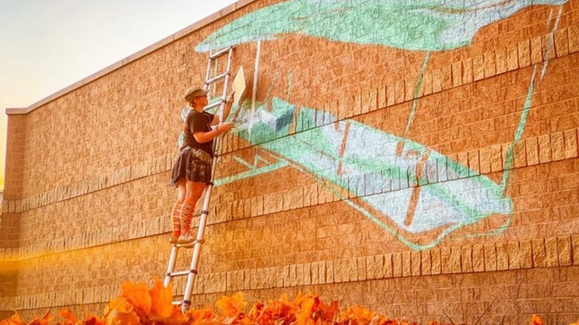 The Mall at Fairfield Commons has joined with Dayton artist Tiffany Clark for large-scale, aviation-themed public murals at the mall in Beavercreek. CONTRIBUTED