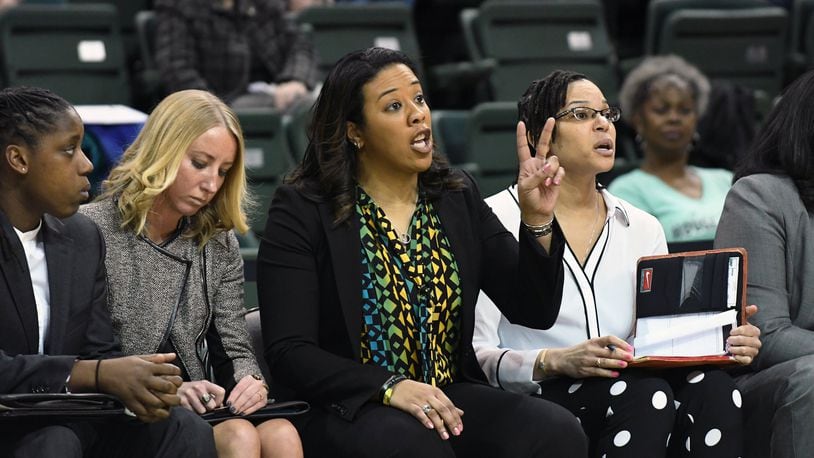 Wright State women’s basketball coach Katrina Merriweather (center). Wright State Athletics photo