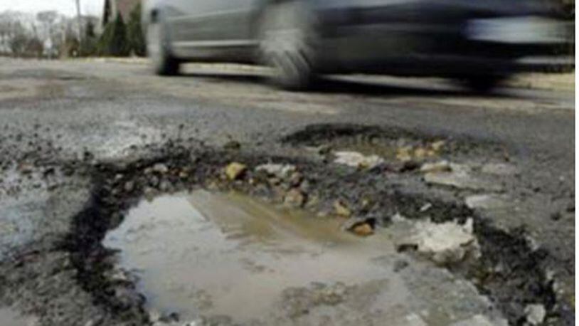 The city of Riverside and the Ohio Department of Transportation will redo East Springfield Street. The road is in poor ocndition, according to the city’s public service director. The pothole pictured here is not on East Springfield Street. FILE PHOTO