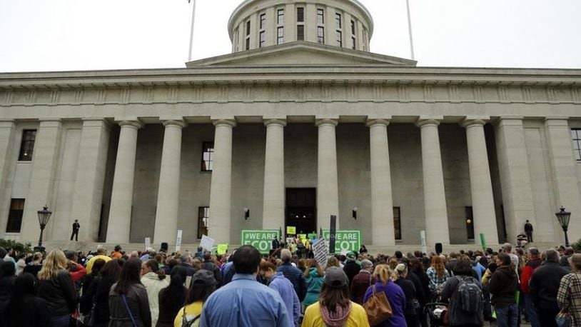 ECOT supporters held a rally at the Ohio Statehouse in Columbus on May 9, 2017. The state is holding back additional funding for ECOT, an online school facing attendance questions. COLUMBUS DISPATCH