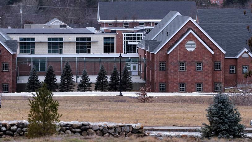 FILE - The Sununu Youth Services Center in Manchester, N.H., stands among trees, Jan. 28, 2020. A former teacher at New Hampshire’s youth detention center testified Monday, April 29, 2024, that she reported suspicious bruises on at least half a dozen teenage boys in the 1990s, including the former resident who filed a landmark lawsuit against the state. (AP Photo/Charles Krupa, File)