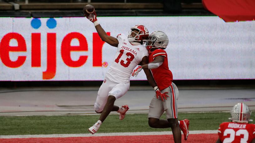 Ohio State defensive back Sevyn Banks, right, breaks up a pass intended for Indiana receiver Miles Marshall during the second half of an NCAA college football game Saturday, Nov. 21, 2020, in Columbus, Ohio. Ohio State beat Indiana 42-35. (AP Photo/Jay LaPrete)