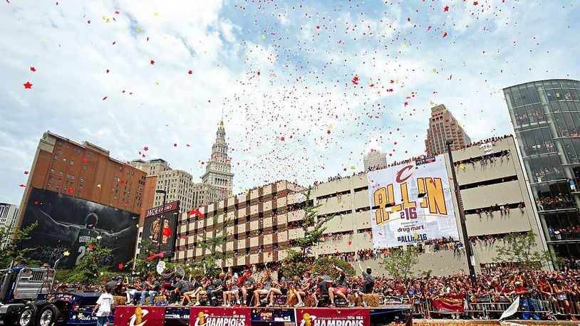 CLEVELAND, OH - JUNE 22: Confetti flies over the parade route during the Cleveland Cavaliers 2016 NBA Championship victory parade and rally on June 22, 2016 in Cleveland, Ohio. (Photo by Mike Lawrie/Getty Images)