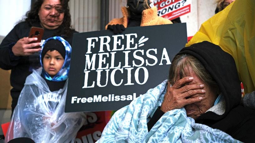 FILE - Esperanza Treviño, Melissa Lucio's mother, pleas to the public as she is surrounded by family and friends on the steps of the Cameron County Courthouse Administrative entrance in Brownsville, Texas, Feb. 7, 2022, that her daughter is innocent and was wrongfully sentenced to death for the murder of Lucio's 2-year-old daughter. A judge has recommended that the conviction and death sentence of Lucio, a Texas woman whose execution was delayed in 2022 amid growing doubts she fatally beat her 2-year-old daughter, should be overturned amid findings that evidence in her murder trial was suppressed. (Miguel Roberts/The Brownsville Herald via AP, File)