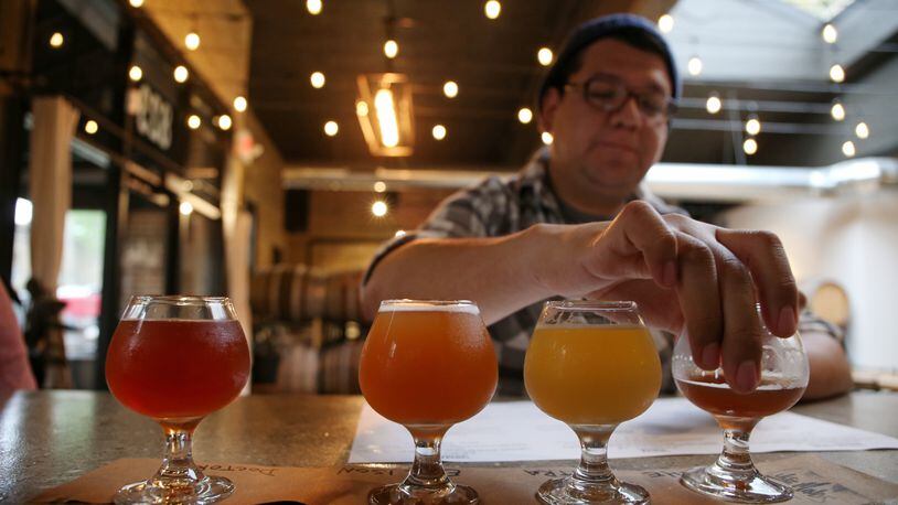 Marco De Anda drinks from a beer flight in the taproom at Like Minds Brewery in Milwaukee on May 24, 2017. (John J. Kim/Chicago Tribune/TNS)