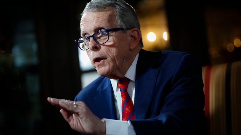 FILE - In this Dec. 13, 2019, file photo, Ohio Gov. Mike DeWine speaks during an interview at the Governor's Residence in Columbus, Ohio. DeWine on Wednesday, Feb. 3, 2021 announced a $10 million grant under his two-year budget proposal to assist more than 700 law enforcement agencies within the state to purchase body-worn camera. (AP Photo/John Minchillo, File)
