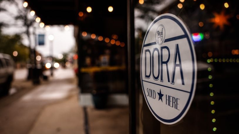 Miamisburg is working to form an oversight board for its newly formed DORA. Many businesses on Main St. are participating. Jim Noelker/Staff