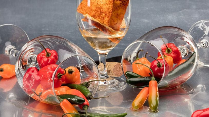 What’s that in your wine? Chile peppers? Tortilla chips? Why isn’t wine that’s just wine good enough for us? Food styling by Mark Graham. (Zbigniew Bzdak/Chicago Tribune/TNS)