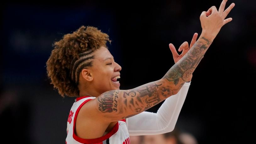 Ohio State guard Rikki Harris reacts to making a 3-point shot during the first half of a first-round college basketball game against Maine in the women's NCAA Tournament, Friday, March 22, 2024, in Columbus, Ohio. (AP Photo/Aaron Doster)