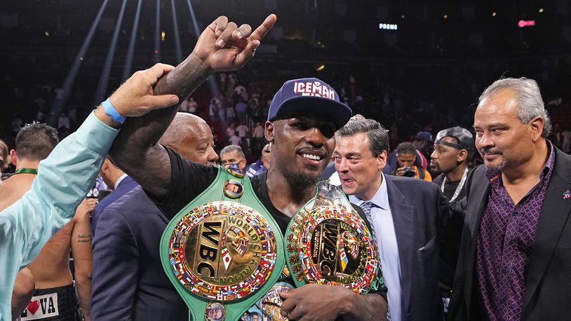 FILE - Jermall Charlo poses with his championship belts after beating Juan Macias Montiel in a WBC middleweight world championship boxing match Saturday, June 19, 2021, in Houston. The World Boxing Council has stripped unbeaten Jermall Charlo of his middleweight title following his arrest this week on suspicion of drunken driving in Texas. The organization's Board of Governors on Tuesday, May 7, 2024, named Carlos Adames its champion in the division. Charlo hasn't defended his title since 2021, and Adames became interim champion in October 2022.(AP Photo/David J. Phillip, File)