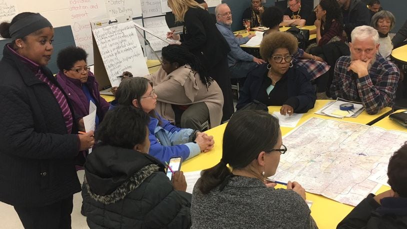 Parents, residents and school employees talk about how Dayton Public Schools should adjust and improve at a community forum Thursday, Feb. 22, 2018 at Meadowdale PreK-6 School. JEREMY P. KELLEY / STAFF