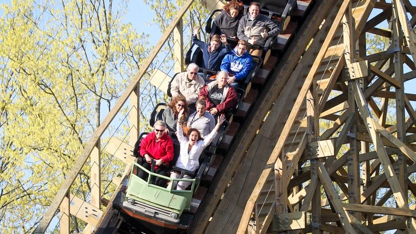 Ride enthusists enjoy an early ride on the new wooden roller coaster, Mystic Timbers, at Kings Island, Thursday, Apr. 13, 2017. GREG LYNCH / STAFF