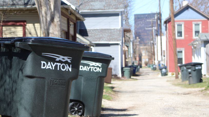 Dayton says it has a backlog of about 900 trash containers. City officials say they are working to fix the problem in coming weeks and months. CORNELIUS FROLIK / STAFF