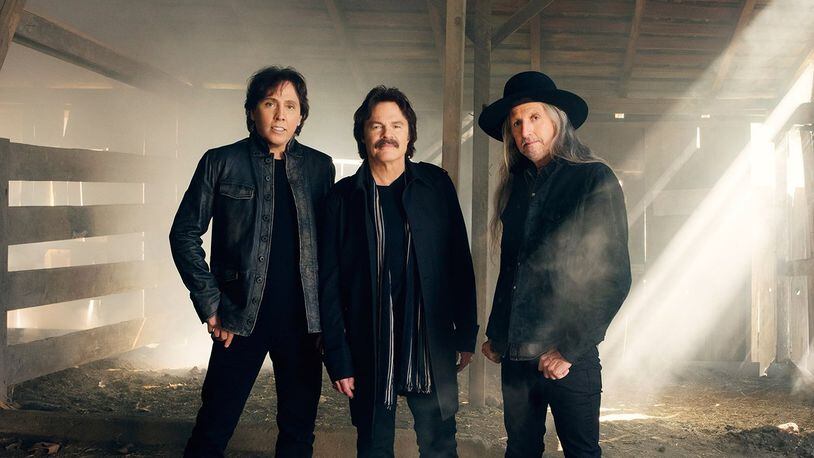 The Doobie Brothers, (left to right) utility man John McFee with founding members Tom Johnston and Pat Simmons, perform at Rose Music Center in Huber Heights on Saturday, Sept. 23. CONTRIBUTED