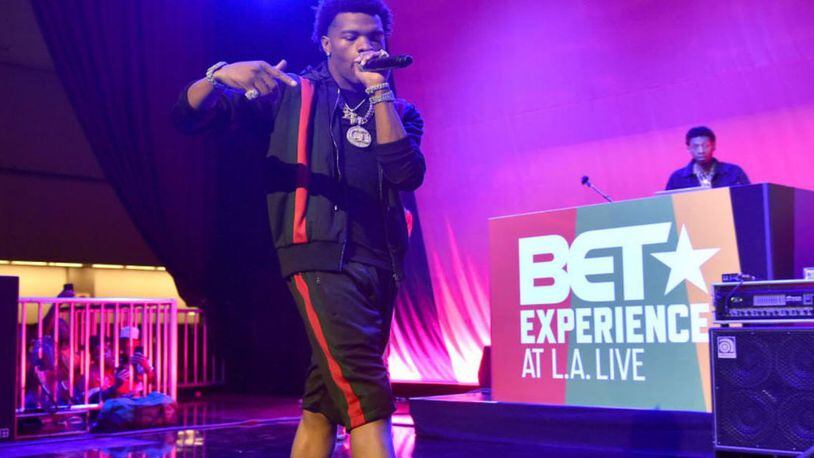 Rapper Lil Baby was performing in Birmingham when shots reportedly rang out Saturday night.