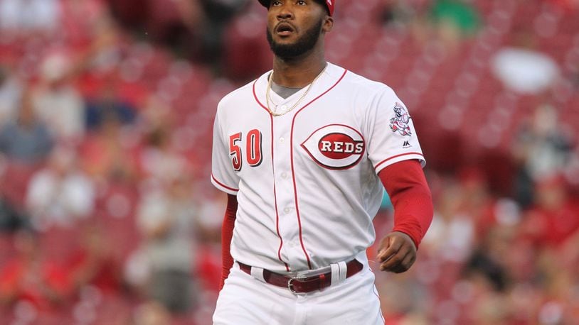Reds starter Amir Garrett leaves the mound after an out against the Orioles on Wednesday, April 19, 2017, at Great American Ball Park in Cincinnati. David Jablonski/Staff