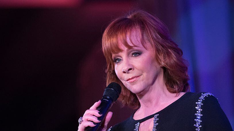 PHOENIX, AZ - MARCH 09:  Reba McEntire speaks onstage at the Celebrity Fight Night's Founders Club Dinner on March 9, 2018 in Phoenix, Arizona.  (Photo by Emma McIntyre/Getty Images for Celebrity Fight Night)