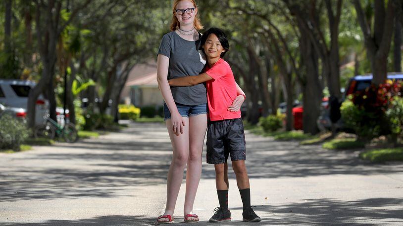 Emily Lieber, 14, and her brother Liam Lieber, 13, ran into a problem when using Uber. When the driver showed up, he told the Hollywood teens they were too young. So Emily did what any resourceful teen would do. She called another Uber. Harried parents and their equally harried kids are relying on Uber to get where they need to go, from school to ballet or football practice — even though it’s technically against company rules. (Mike Stocker/Sun Sentinel/TNS)