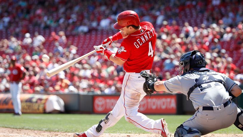 CINCINNATI, OH - AUGUST 10: Scooter Gennett #4 of the Cincinnati Reds hits a grand slam home run in the seventh inning of a game against the San Diego Padres at Great American Ball Park on August 10, 2017 in Cincinnati, Ohio. (Photo by Joe Robbins/Getty Images)