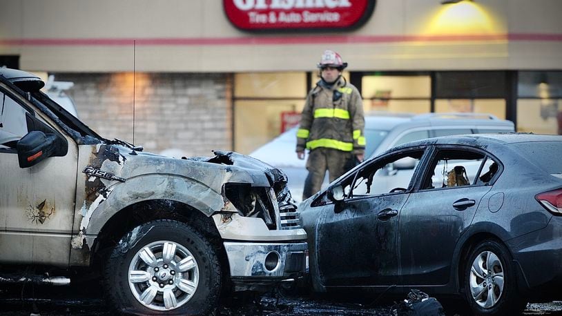 Police and medics responded to a fiery, multi-vehicle crash Tuesday afternoon, Jan. 24, 2023, on Brandt Pike north of Chambersburg Road in Huber Heights involving a white BMW reported stolen out of Clark County. MARSHALL GORBY/STAFF