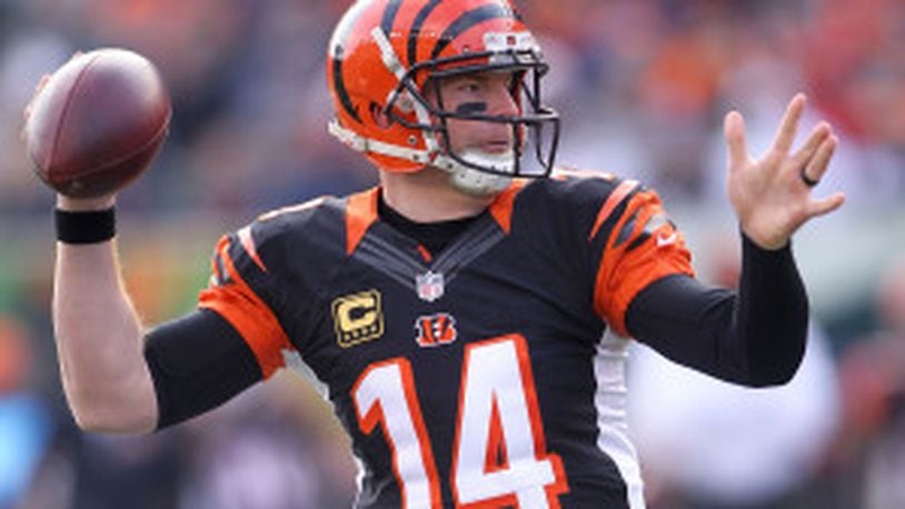 CINCINNATI, OH - JANUARY 1: Andy Dalton #14 of the Cincinnati Bengals throws a pass during the first quarter of the game against the Baltimore Ravens at Paul Brown Stadium on January 1, 2017 in Cincinnati, Ohio. (Photo by John Grieshop/Getty Images)