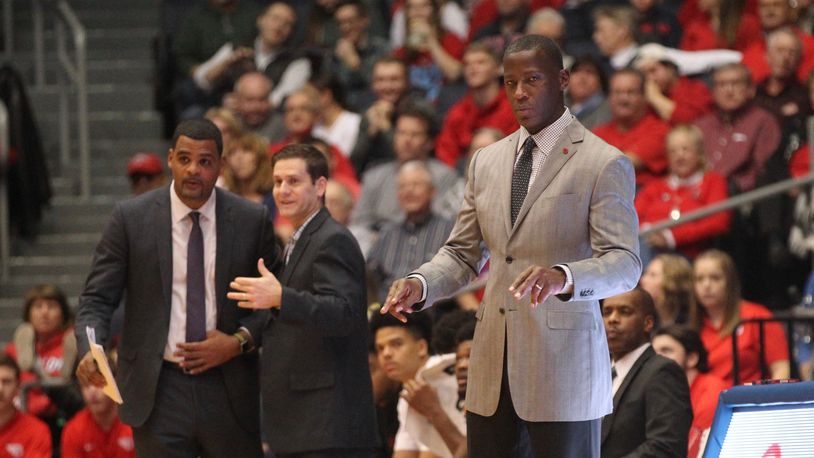 Dayton’s Anthony Grant, right, coaches during a game against Western Michigan as assistants Ricardo Greer, left, and Darren Hertz watch on Dec. 19, 2018, at UD Arena. David Jablonski/Staff