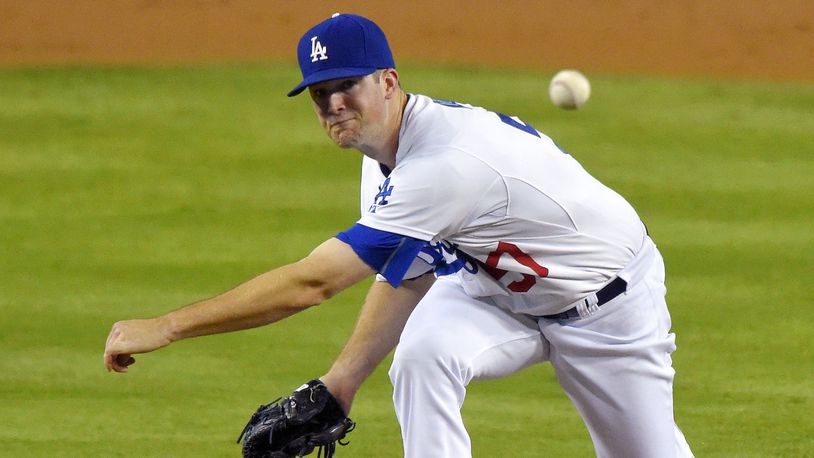 Los Angeles Dodgers starting pitcher Alex Wood throws to the plate during the second inning of a baseball game against the San Diego Padres, Friday, Oct. 2, 2015, in Los Angeles. (AP Photo/Mark J. Terrill)