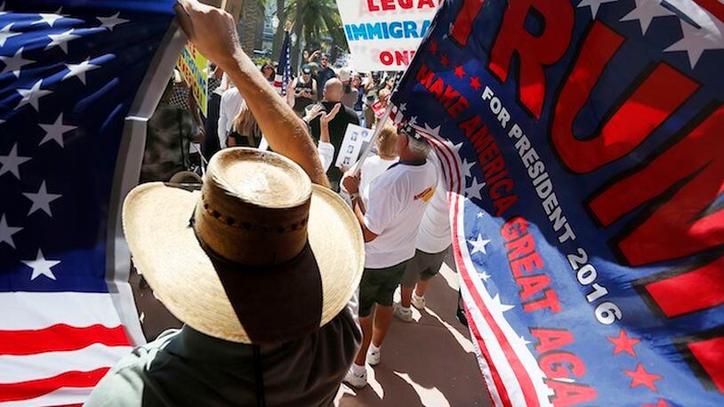 About 100 of Donald Trump's Latino supporters rally outside Anaheim City Hall on Sunday, Aug. 28, 2016. (Luis Sinco/Los Angeles Times/TNS)