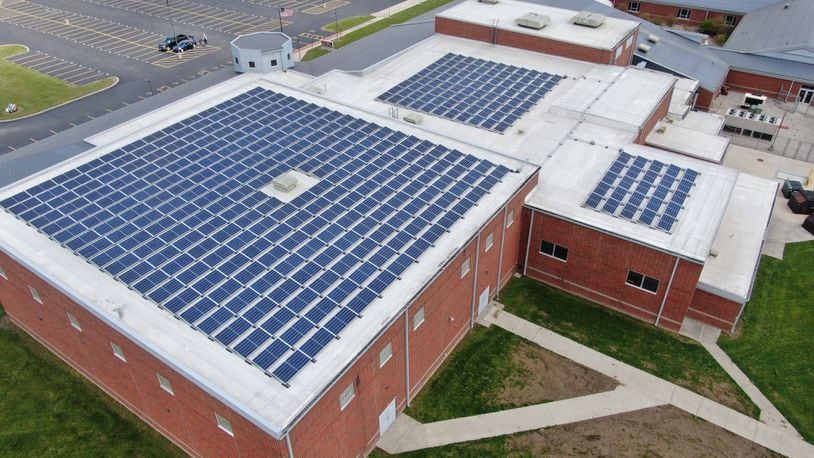 New Lebanon elementary and high schools had solar panels installed on their roofs to cut energy cost.
