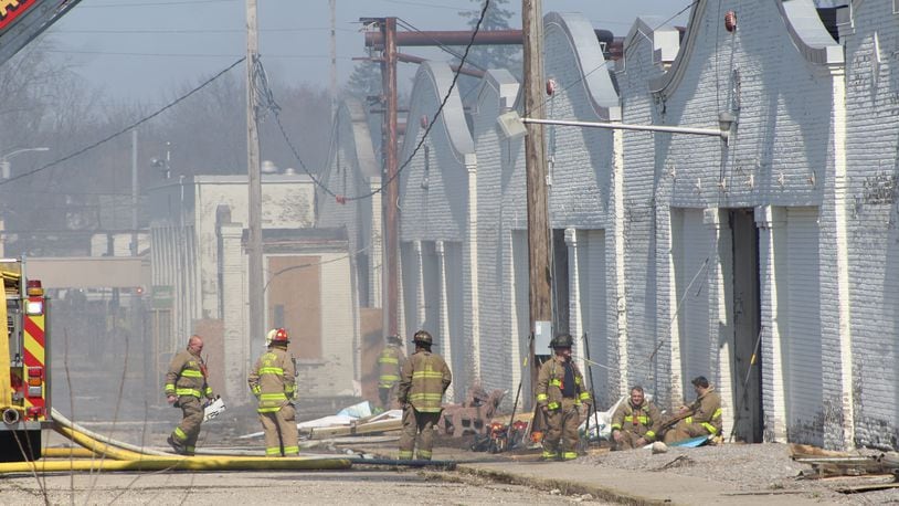 Dayton firefighters at the scene of a fire at the historic Wright brothers factory site in West Dayton on Sunday, March 26, 2023. CORNELIUS FROLIK / STAFF