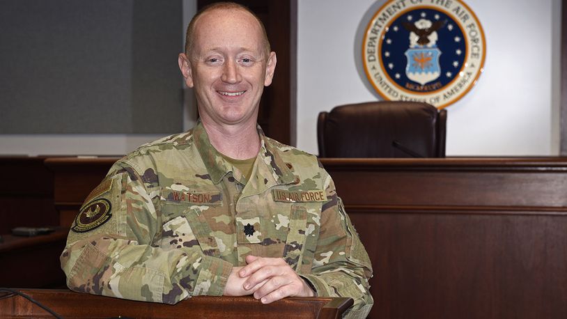 Lt. Col. Dan Watson, chief of Air Force Materiel Command’s Acquisition Law Division, is pictured in the U.S. courtroom at Wright-Patterson Air Force Base on April 20, prior to pinning on the rank of colonel. He began his Air Force career at Wright-Patterson as an enlisted military working dog handler. U.S. AIR FORCE PHOTO/TY GREENLEES