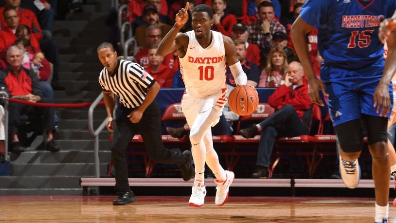 Dayton point guard Jalen Crutcher scored 19 points and dished out five assists in the Flyers’ 81-69 win over Presbyterian on Saturday at UD Arena. Erik Schelkun/CONTRIBUTED