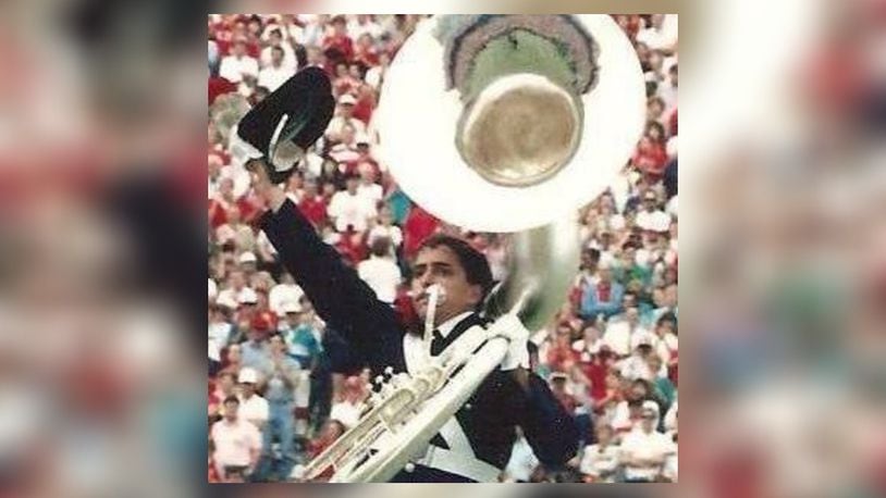 Miamisburg resident Darren Montgomery dotted the “i” in Script Ohio in 1988 as an Ohio State University sousaphone player. CONTRIBUTED