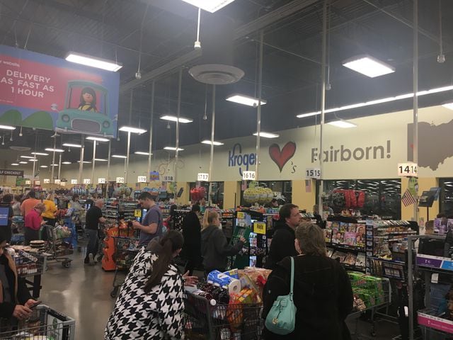 PHOTOS: Long lines, empty shelves at local grocery stores