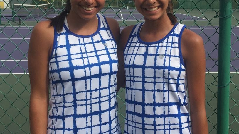 This is Anke (left) and Reka (right) Patel, the D-I top-seeded sectional doubles team from Springboro. They advanced to the district tournament today. Debbie Juniewicz/CONTRIBUTED