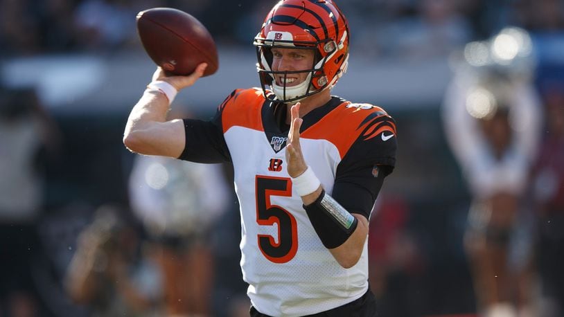 OAKLAND, CA - NOVEMBER 17: Quarterback Ryan Finley #5 of the Cincinnati Bengals passes against the Oakland Raiders during the second quarter at RingCentral Coliseum on November 17, 2019 in Oakland, California. (Photo by Jason O. Watson/Getty Images)
