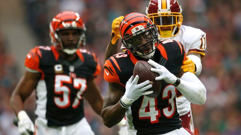 Bengals free safety George Iloka intercepted a pass against the Redskins last season in London. More recently, he made a pass at his girlfriend, Gaby Barcelo, and she accepted his singing video proposal and agreed to marry.