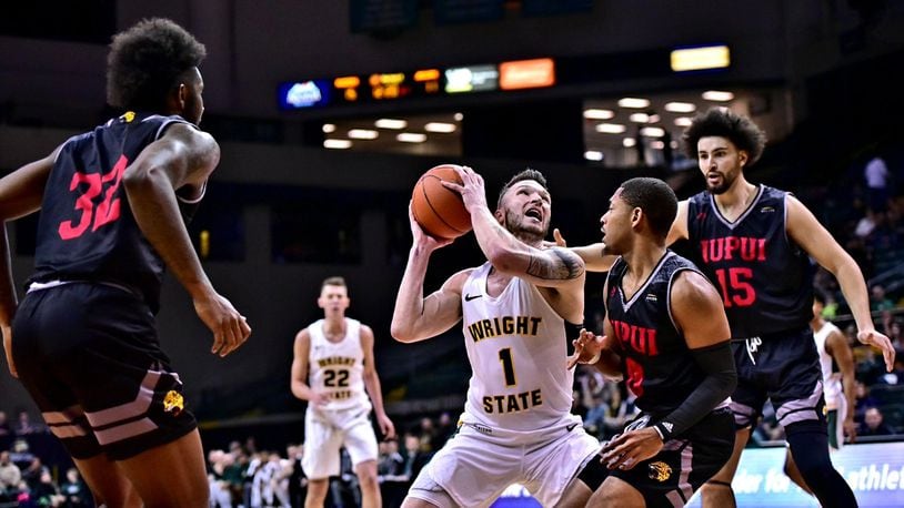Wright State’s Bill Wampler looks for a shot during Sunday’s game against IUPUI at the Nutter Center. Joseph Craven/CONTRIBUTED