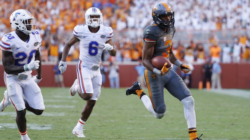 KNOXVILLE, TN - SEPTEMBER 24: Josh Malone #3 of the Tennessee Volunteers runs into the end zone with a 42-yard touchdown reception against the Florida Gators in the fourth quarter at Neyland Stadium on September 24, 2016 in Knoxville, Tennessee. Tennessee defeated Florida 38-28. (Photo by Joe Robbins/Getty Images)