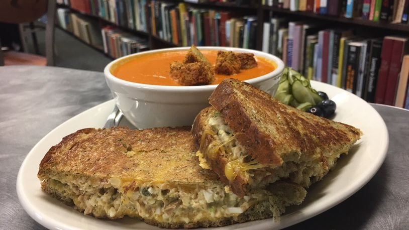 A tuna melt with Tillamook cheddar and a bowl of homemade cream of tomato soup taken surrounded by books at Table of Contents Cafe. CONTRIBUTED PHOTO BY ALEXIS LARSEN
