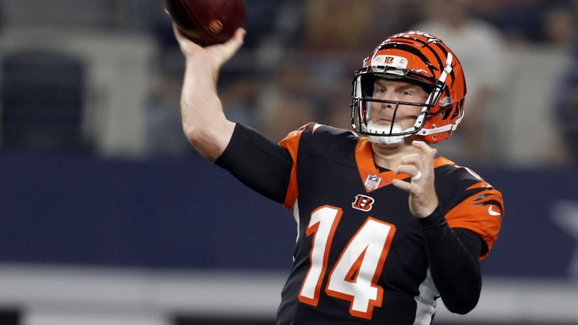 Cincinnati Bengals quarterback Andy Dalton (14) completes a pass in the first quarter against the Cowboys on Saturday, Aug. 18, 2018 at AT&T Stadium in Arlington, Texas. (Bob Booth/Fort Worth Star-Telegram/TNS)
