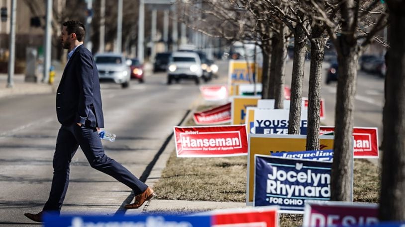 Political signs line the middle of Third Street in front of the Montgomery County Board of Elections Wednesday February 21, 2024 the first day of early voting in the March 19 election. JIM NOELKER/STAFF