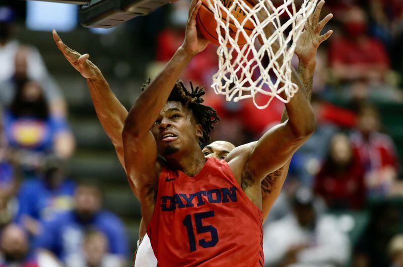 Dayton's DaRon Holmes II takes the ball to the basket against Miami on Thursday, Nov. 25, 2021, in the first round of the ESPN Events Invitational at the HP Fieldhouse in Kissimmee, Fla. David Jablonski/Staff