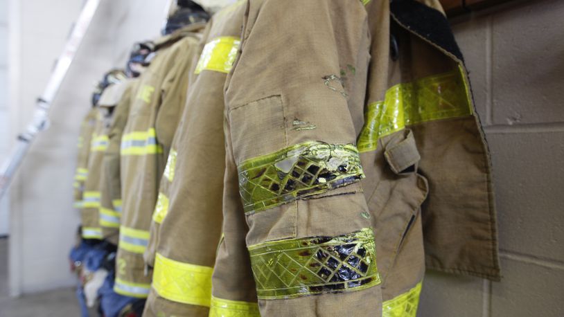 A worn and fire-damaged coat hangs in Moraine Fire Station 29 on South Dixie Drive.
