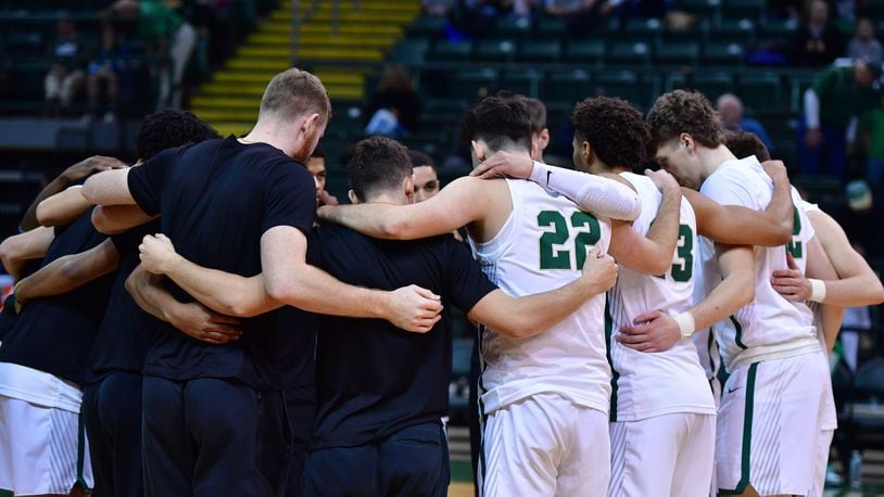 Members of the Wright State men's basketball team huddle before a game earlier this season. Wright State Athletics photo