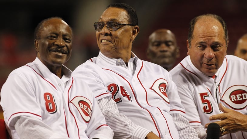 Joe Morgan, Tony Perez and Johnny Bench listen to Pete Rose talk during a ceremony honoring Perez on Friday, Aug. 21, 2015, at Great American Ball Park in Cincinnati. David Jablonski/Staff