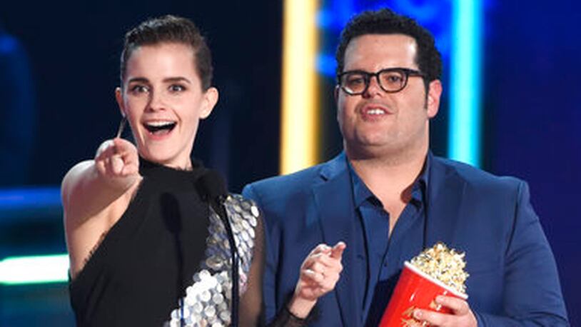 Emma Watson, left, and Josh Gad accept the award for movie of the year for "Beauty and the Beast" at the MTV Movie and TV Awards at the Shrine Auditorium on Sunday, May 7, 2017, in Los Angeles. (Photo by Chris Pizzello/Invision/AP)