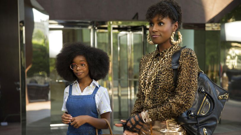 This image released by Universal Pictures shows Marsai Martin, left, and Issa Rae in a scene from "Little."