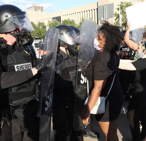 PHOTOS: Protesters, police clash Saturday night in downtown Dayton