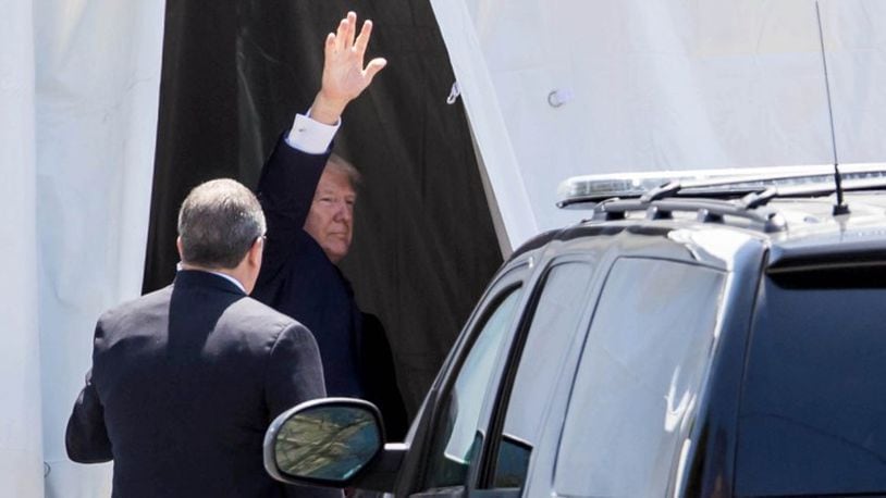 President Donald J. Trump’s waves to crowd as he exits Bethesda-by-the-Sea Episcopal Church in Palm Beach, Florida on Easter Sunday, April 16, 2017. (Photo: Allen Eyestone / Palm Beach Post)
